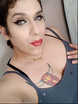 Lustful streetwalker puts on sexy bra