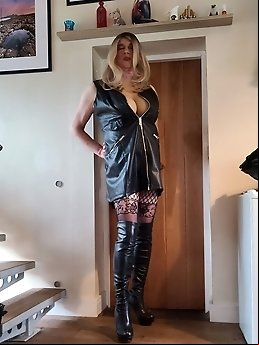 She is dressed in a bra and panties.